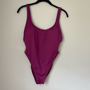 LeBlanca women’s gold button side accent one piece swimsuit peekaboo cut out